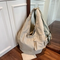 Large beige tote bag in nylon with minimalist knotted strap and side pockets - Khaki