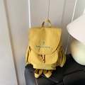Vibrant yellow nylon backpack with Take It Easy embroidery and drawstring side pocket - Yellow