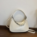 Minimalist white crescent dumpling bag with pearl and silver heart charm chain decor - Off White