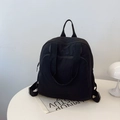 Mochila negra minimalista para mujer en nailon con gran capacidad y múltiples bolsillos - Negro
