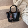 Elegant black leather tote bag with embossed lettering and cute brown bear pendant - With Charm / Black
