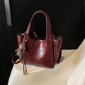 Vintage burgundy leather bucket bag with top handle and adjustable shoulder strap - With Charm / Burgundy