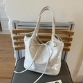 Elegante borsa tote jacquard bianco perla con texture argentata e dettaglio fiocco - Champagne