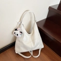 White faux leather versatile tote bag with crossbody strap and panda charm detail - White