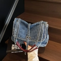 Vintage dunkelblaue Denim-Tasche mit braunen Ledergriffen und Silberschnalle - Blau