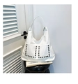 Detail view of a white faux leather hobo bag with silver hexagonal rivets and front pockets - One Size / White