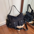 Large black nylon tote bag with utility pockets and silver buckles for casual daily use - Black