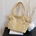 Light yellow quilted tote bag with drawstring detail and minimalist large capacity design - Yellow