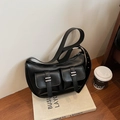 Black half-moon crossbody bag with utility pockets and silver metal buckle details - Black