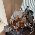 Minimochila vintage de lona azul grisáceo con adornos de cuero marrón y hebillas - Azul