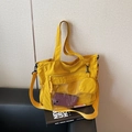 Large bright yellow nylon tote bag with transparent front pocket and matching small pouch - Yellow