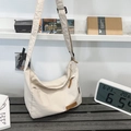 Off-white nylon crossbody bag with adjustable strap and leather logo detail - Off White