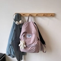 Light purple nylon backpack with white bear keychain and square woven brand label - Purple With Pendant