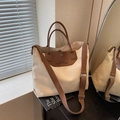 Off-white canvas tote bag with dark brown leather handles and adjustable straps for women - Beige Grey