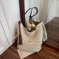 Beige woven straw shoulder bag with brown leather straps and tassel detail - Off White