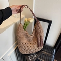 Retro straw shoulder bag with brown leather handles and decorative tassel detail - Khaki