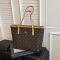 Bolso tote marrón con diseño de monograma floral y asas de cuero estilo elegante - Marrón