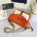 Orange and cream nylon messenger bag with adjustable strap and smiley charm - No Pendant / Orange Contrast