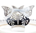 Macro view of laser-cut silver pearl paper candy box with light blue silk ribbon bow - Reflective Silver