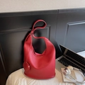 Minimalist red leather tote bag with pebble texture and matching shoulder strap - Burgundy