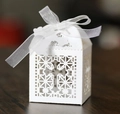 Detailed laser-cut white hollow cross gift box with elegant white chiffon ribbon bow - With Cross Tag Style