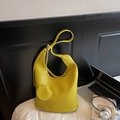 Minimalist bright yellow lychee texture tote bag with round matching coin purse accessory - Green