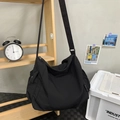 Large black nylon tote bag with CHUANGMI side label and wide crossbody shoulder strap - Black