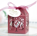 Detail of red laser-cut swan favor box with pearl paper texture and thank you tag - Dark Red