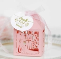 Detail of pink laser-cut wedding favor box with Mr & Mrs silhouette and thank you tag - Pink