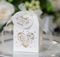 Detailed view of white laser-cut LOVE heart candy box with ribbon and thank you tag - Ivory