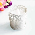 Involucro di carta bianca traforata tagliata al laser per candele LED e cupcake - Argento