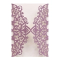 Macro shot of laser-cut glitter paper wedding invitation with intricate floral lace detail - Glitter Lavender