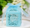 Detail of light blue laser-cut hollow rose wedding favor box with a matching silk ribbon - Tiffany Blue