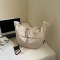Beige nylon dumpling shoulder bag with textured fabric and wide adjustable strap - Large / Off White
