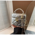 Silver quilted crossbody bucket bag with chain strap and heart pendants in silver finish - Silver