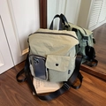 Sage green nylon travel backpack with front transparent pocket and adjustable black strap - Army Green