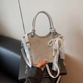 Light grey crossbody bucket bag in suede texture with pearl bow and lace charm - Silver