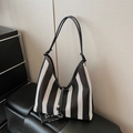 Striped black and white mesh tote bag with knotted slim straps and V-shaped opening - Black