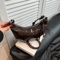 Chocolate brown patent leather croissant bag with knotted strap and silver zipper - Brown