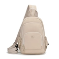 Detail view of beige nylon crossbody bag featuring multi-pocket structure and adjustable strap - Khaki