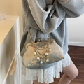Elegant light blue jacquard kiss-lock bag with gold floral patterns and pearls - Light Blue