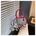 Blue denim underarm bag with red leather trim and silver star pendant detail - With Charm / Red