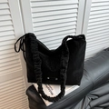 Minimalist black tote bag with textured silver accents and pleated drawstring strap - Black without Pendant