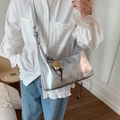 Metallic silver Hobo bag with sports pendant and adjustable strap for women - With Charm / Silver