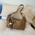 Brown faux leather hobo dumpling bag with vintage baseball keychain accessory - With Charm / Brown