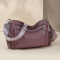 Deep purple quilted nylon crossbody bag with multi-zipper pockets and adjustable strap - Cinnamon Pink