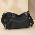 Lightweight black nylon crossbody bag featuring quilted patterns and multiple pockets - Classic Black