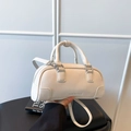 White litchi pattern leather bowling bag with top handles and adjustable strap - White