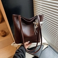 Dark brown woven leather tote bag with star charm and long strap for commuting - Coffee