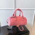 Pink lychee grain leather mini bowling bag with dual handles and silver logo detail - Pink